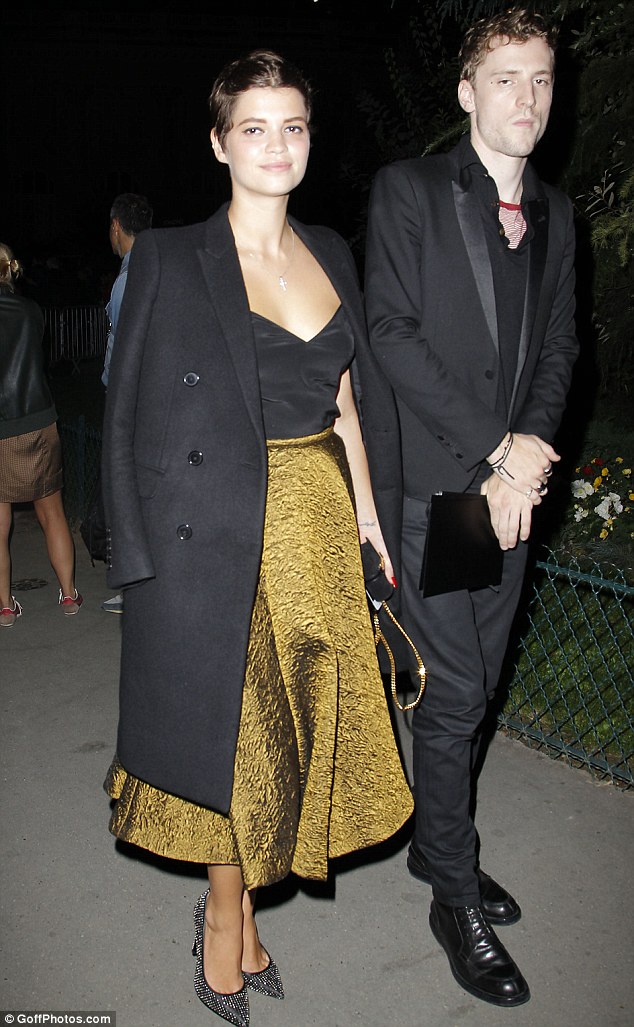 Model behaviour: British model Pixie Geldof showed off her style credentials in a metallic midi-skirt, simple black cami and a black wool coat